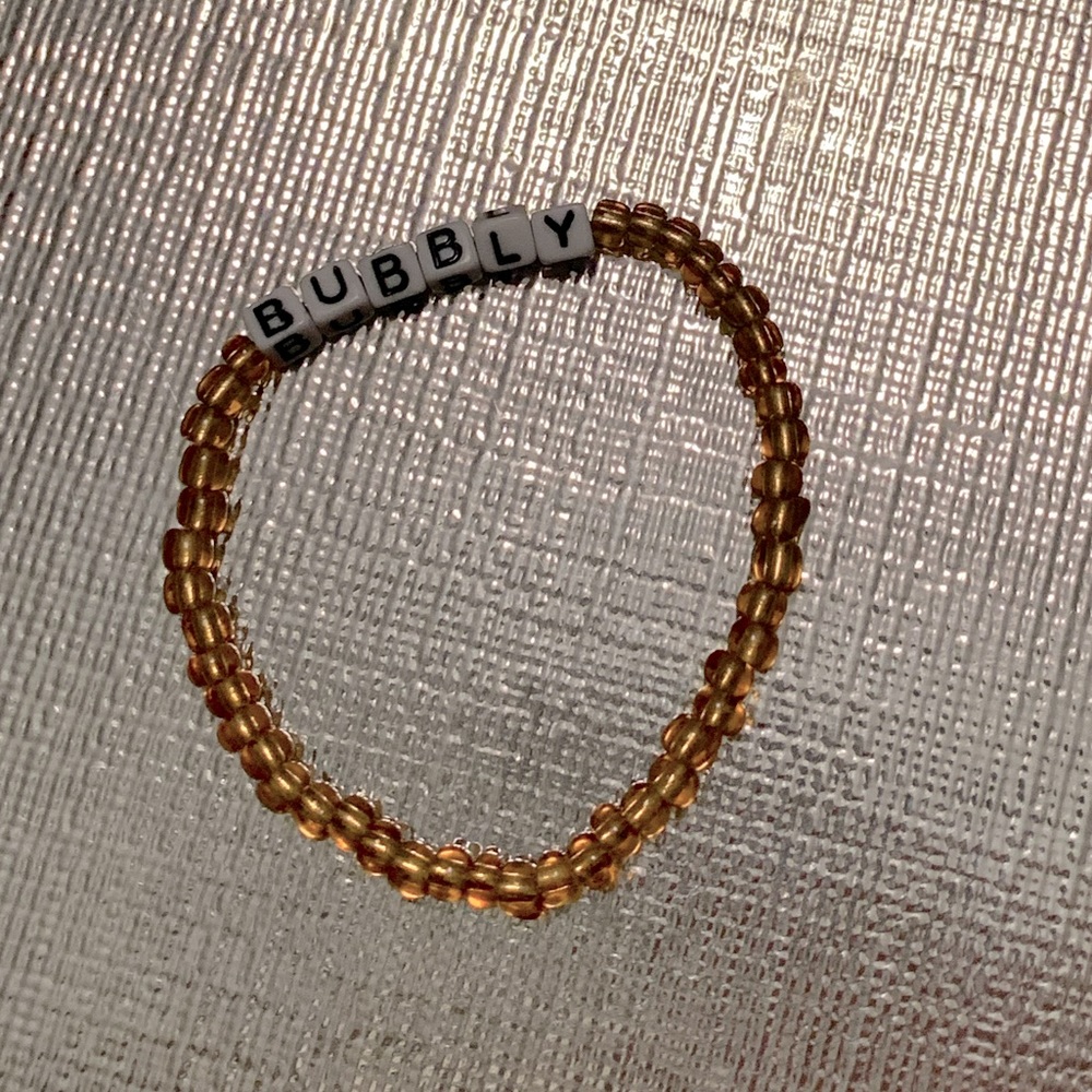 Bubbly 🥂 stretchy bracelet/ gold color beads